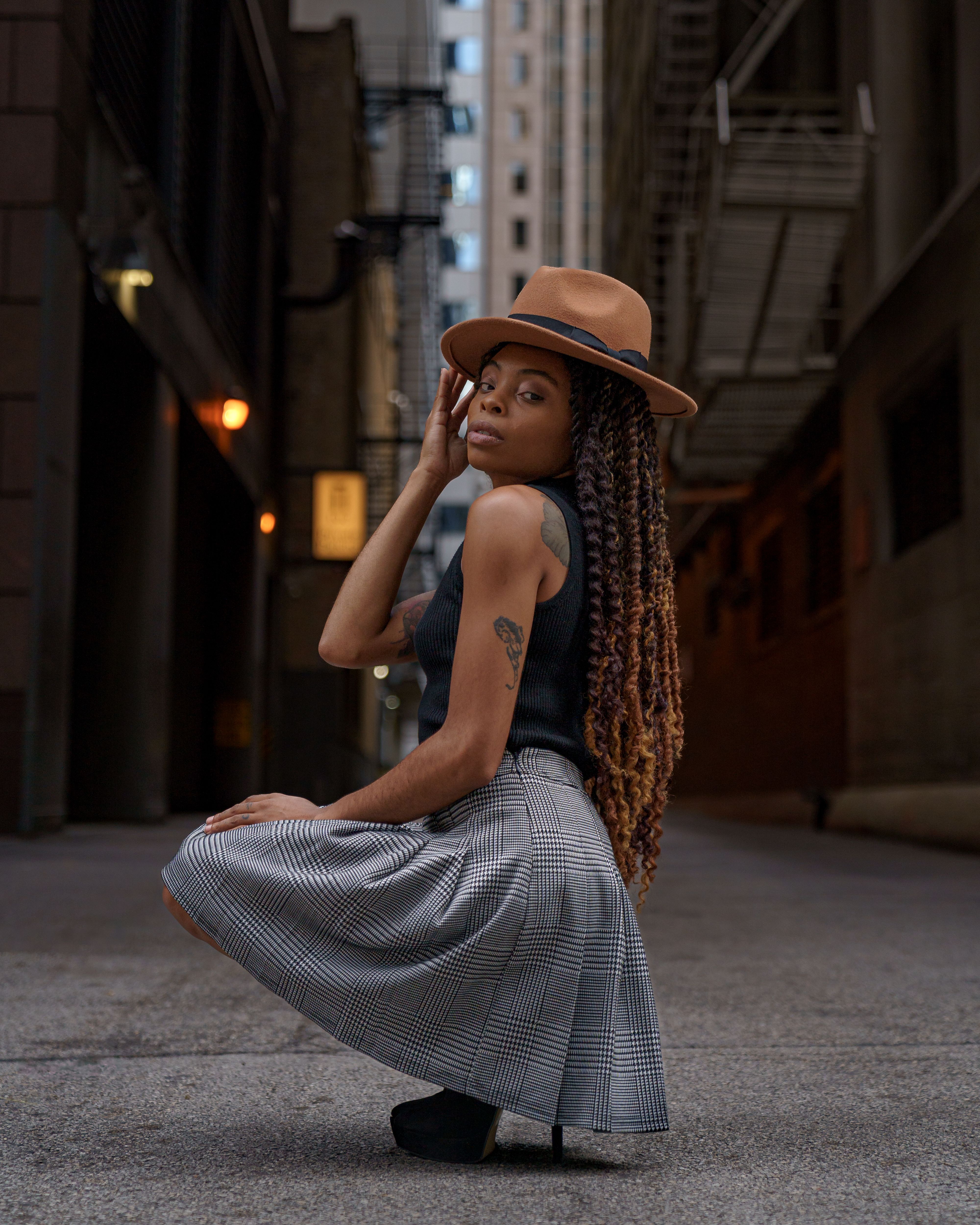 A Fashionable Woman Posing on the Street · Free Stock Photo