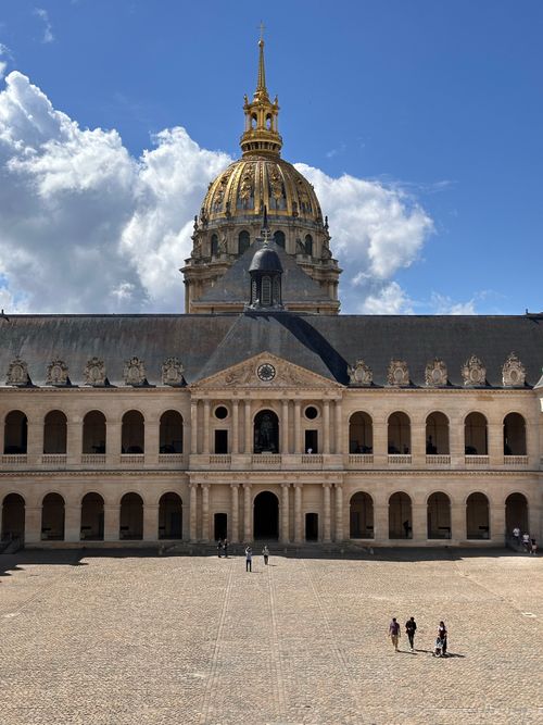 Free Stunning view of Les Invalides dome in Paris with a clear blue sky and sunlight highlighting the architecture. Stock Photo