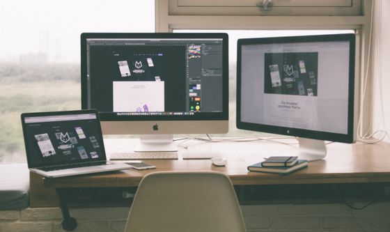 Laptop showing a website layout, photo by Tranmautritam on Pexels