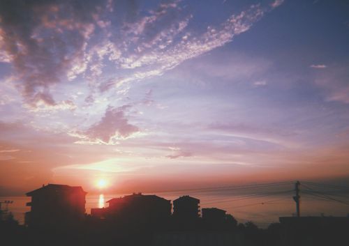 Free Silhouette of buildings against a vibrant sunset in Turkey. Stock Photo