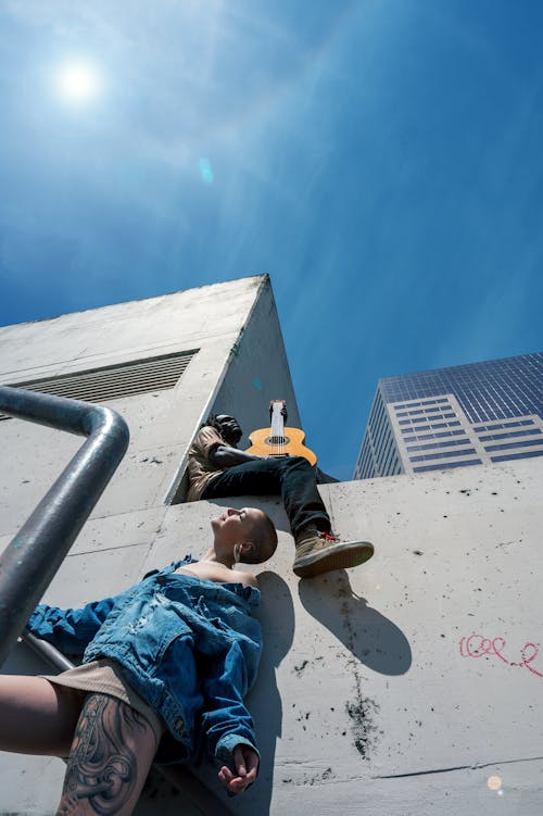 Free Two People on Concrete Building Stock Photo