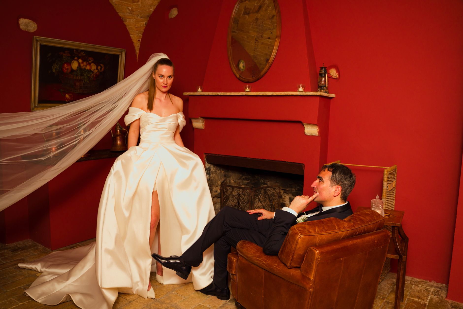 Bride and groom in a chic interior, capturing classic wedding elegance.