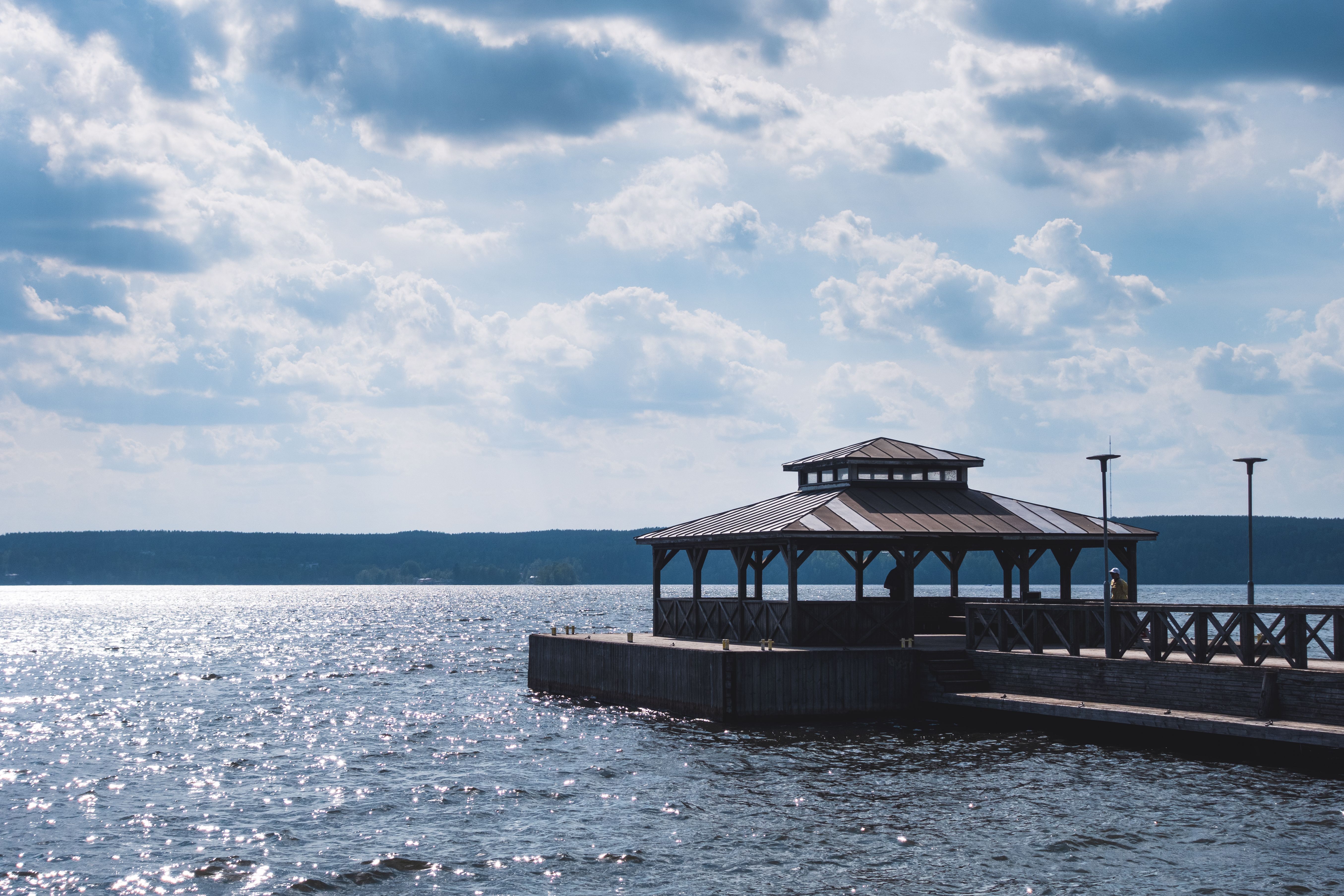 Wooden Pier on a Lake Under the Clouds · Free Stock Photo