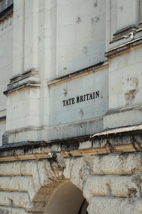 The entrance to the building has a sign that says time britain
