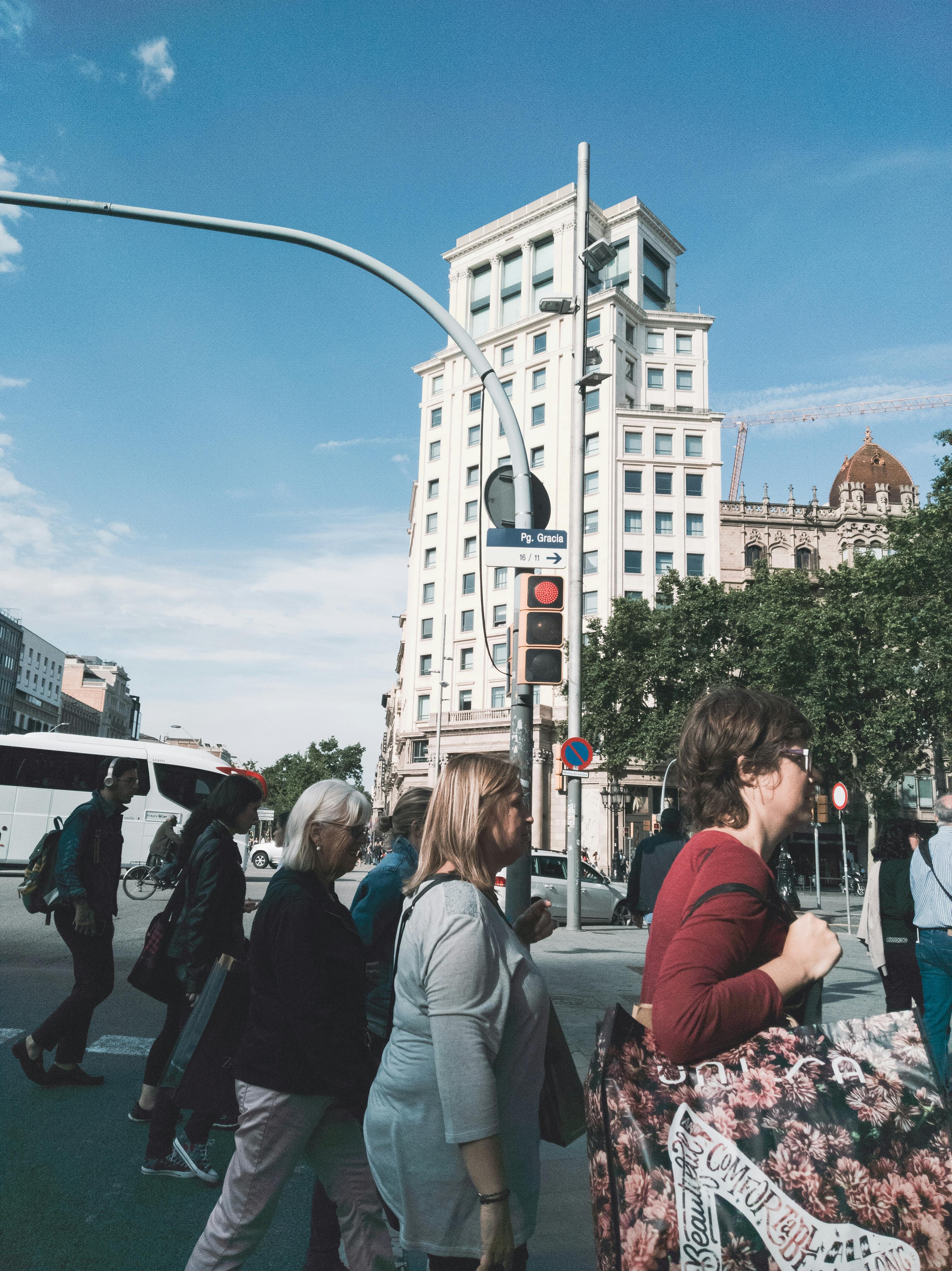 people walking on gray top road