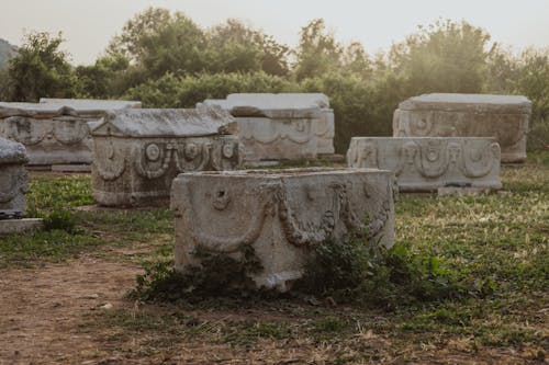 A group of stone monuments in the sun