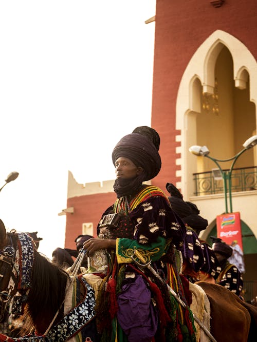 Performars in Traditional Costumes on Horses