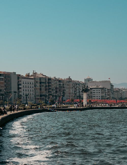 A city with a pier and buildings in the background