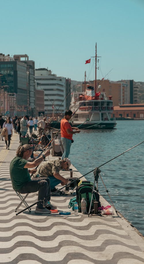 People fishing on the waterfront in istanbul