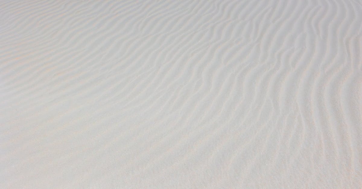 Peaceful sand patterns shaped by the wind at Sankt Peter-Ording, Germany.