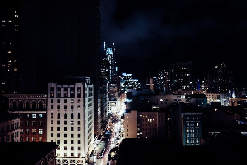 a city grid at night from above — photograph by Mo Eid on Pexels