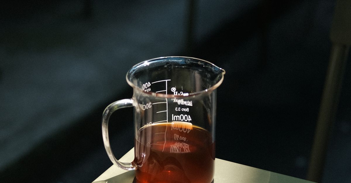 Measuring Cup of Tea on the Table · Free Stock Photo