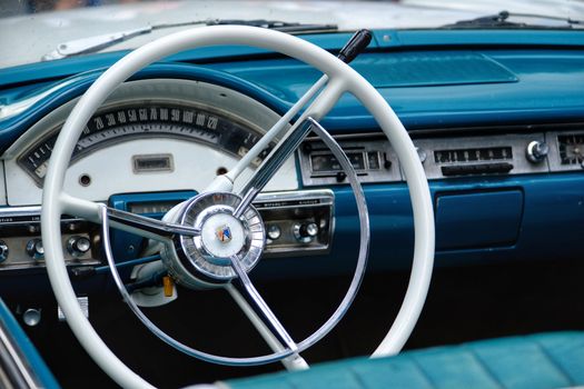 Classic blue vintage car dashboard and steering wheel interior in Ciudad de México, CDMX.