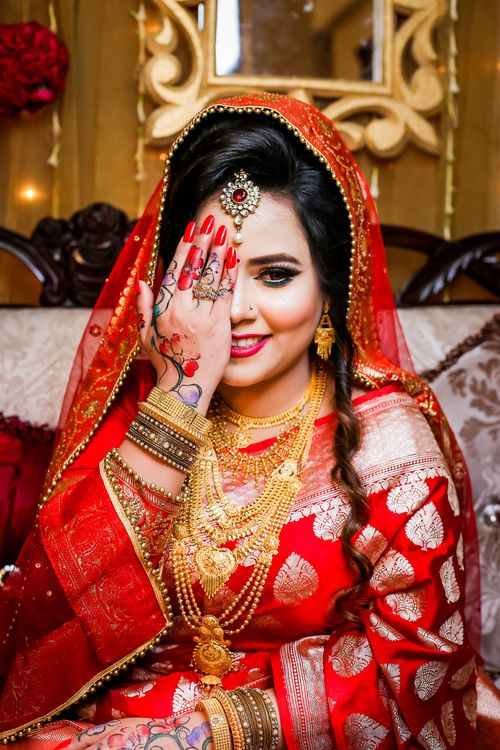 Woman in Red Traditional Dress Posing with Hand on Half of Face  Free  Stock Photo