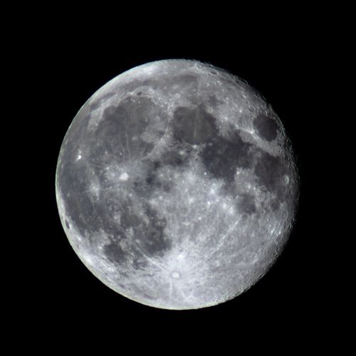 Free Close-up image of the full moon showcasing craters and lunar surface details. Stock Photo
