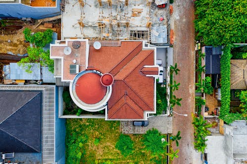 High-angle Photo of Red Roof Shingles