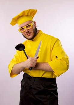 A playful chef in yellow attire posing with cutlery. Perfect for culinary and lifestyle content.