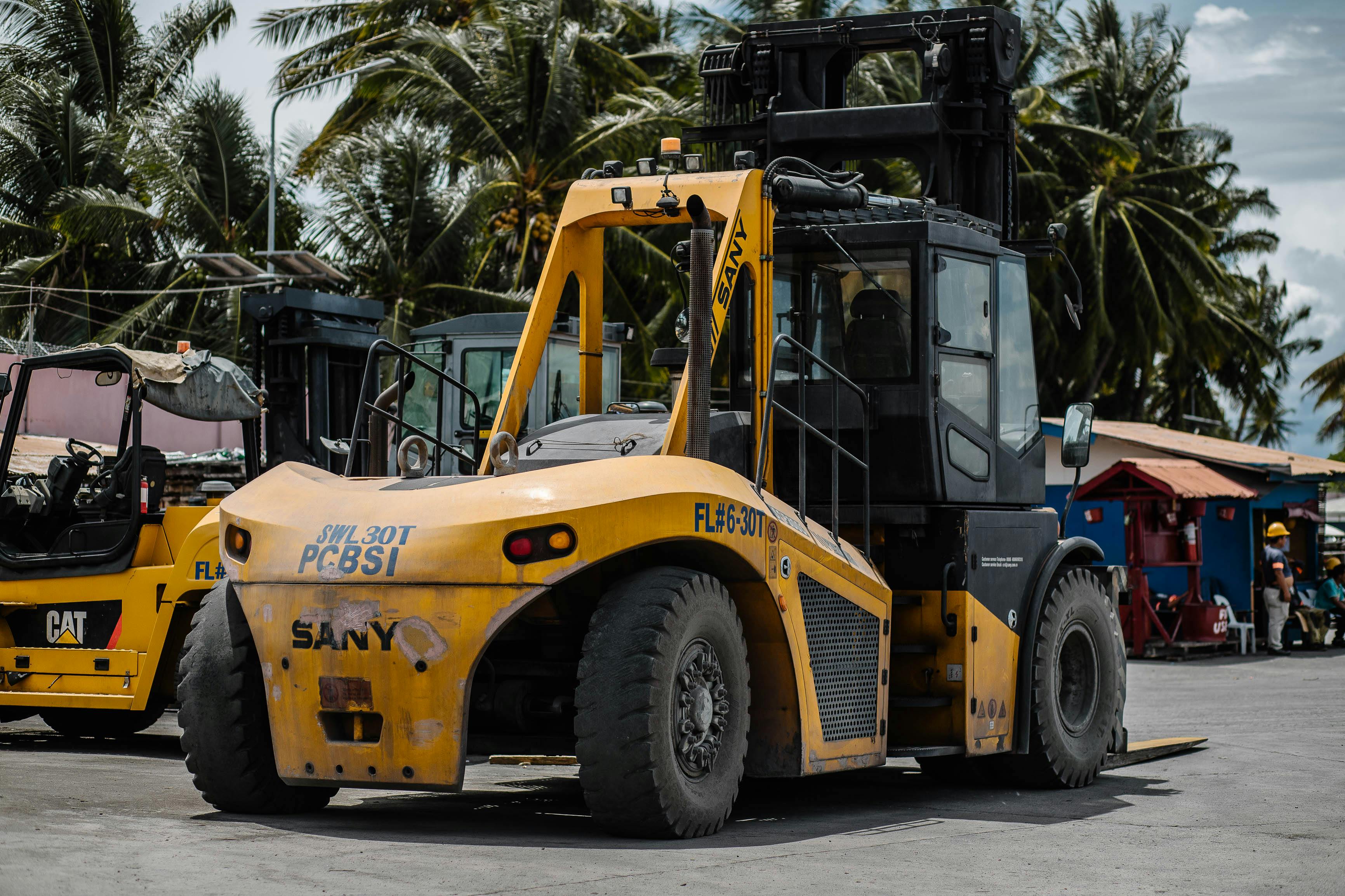 Photo of Parked Yellow Forklift Truck · Free Stock Photo