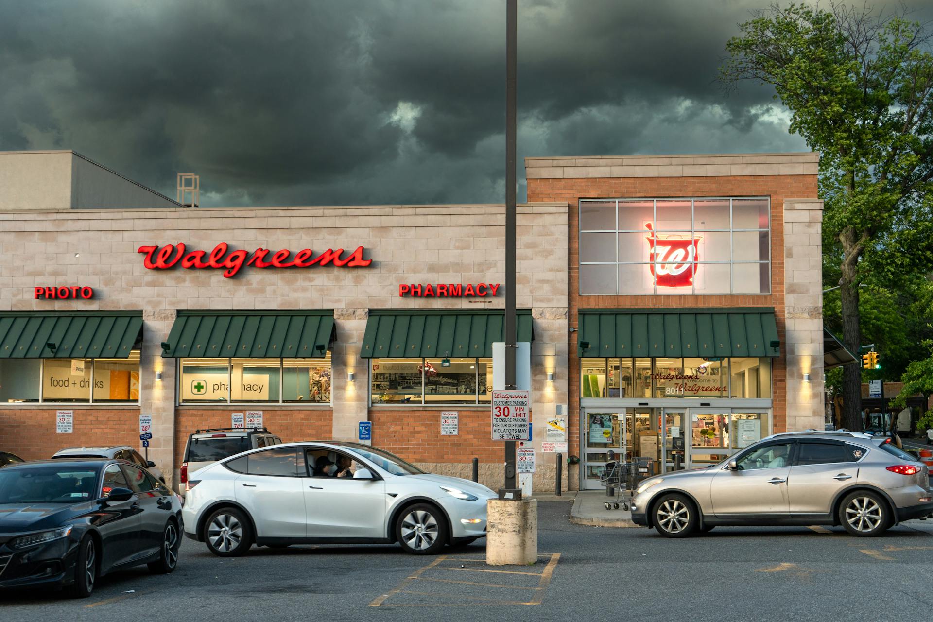 Walgreens Pharmacy Store under Dark Clouds