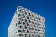 Geometrical Glass and Brick Facade of Tall Building