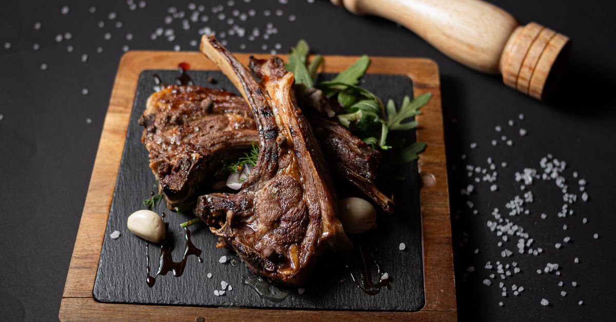 Red Meat With Rosted A Roasted Piece of Red Meat Lying on the Table · Free Stock Photo