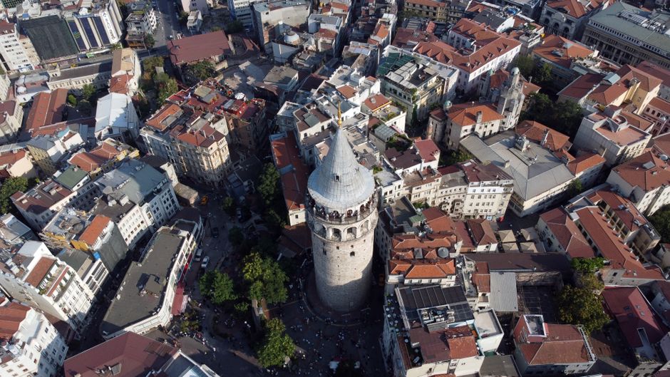 Best Gyrocopter Tour over the Pamukkale Travertines Review: Soaring Above Turkey's Cotton Castle Review 2026 - A stunning aerial view of Galata Tower surrounded by Istanbul's vibrant architecture.