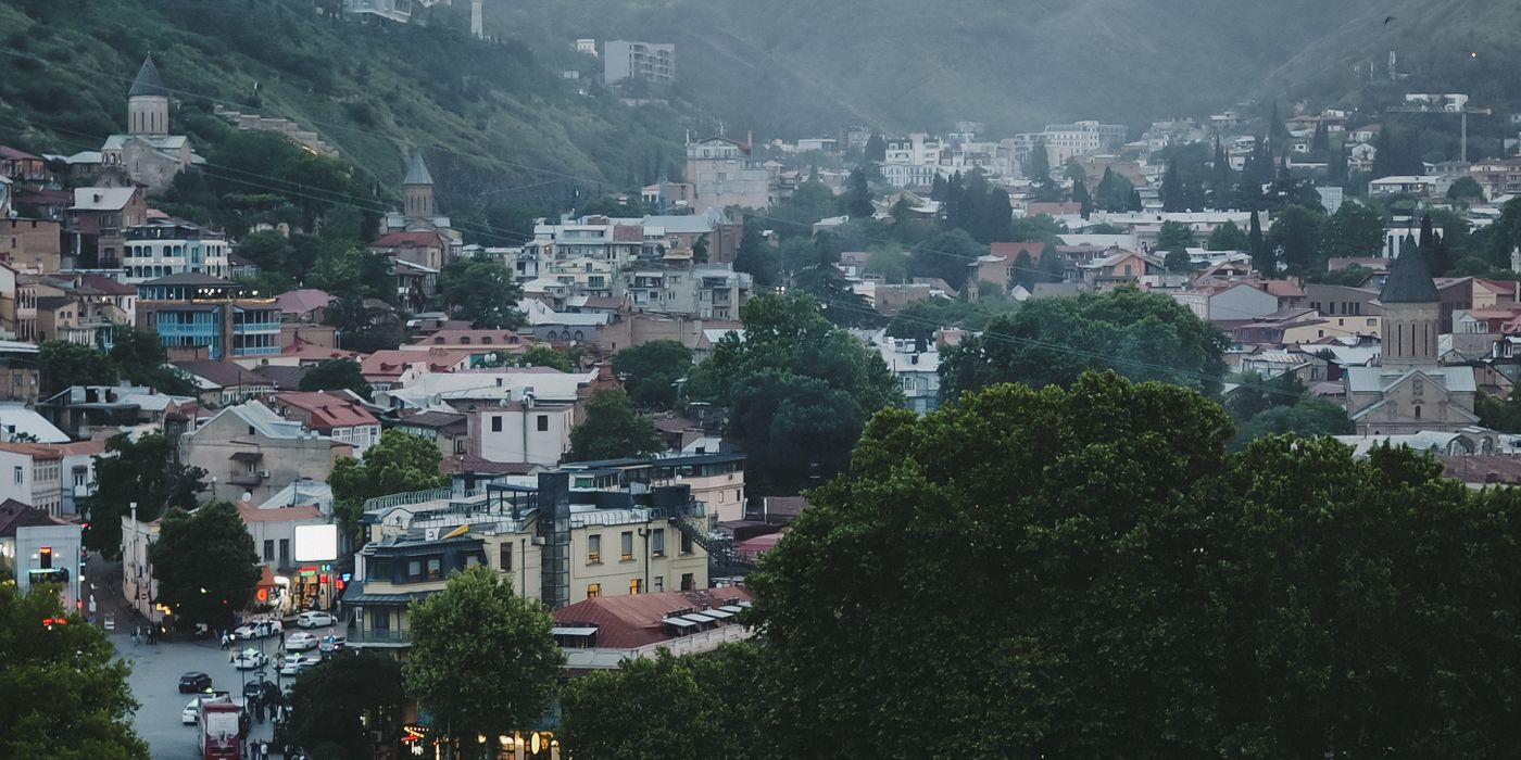 Tbilisi cityscape in a valley among the hills, Republic of Georgia