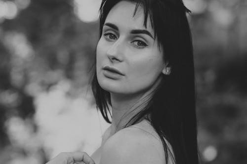 Free Selective Focus Grayscale Photo of Woman Posing Stock Photo