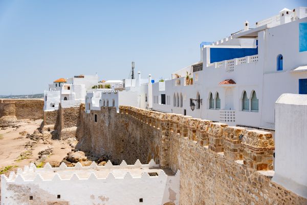 Asilah whitewashed medina murals Morocco