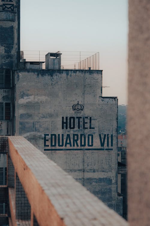 A hotel sign on a building with the words hotel eduard vii