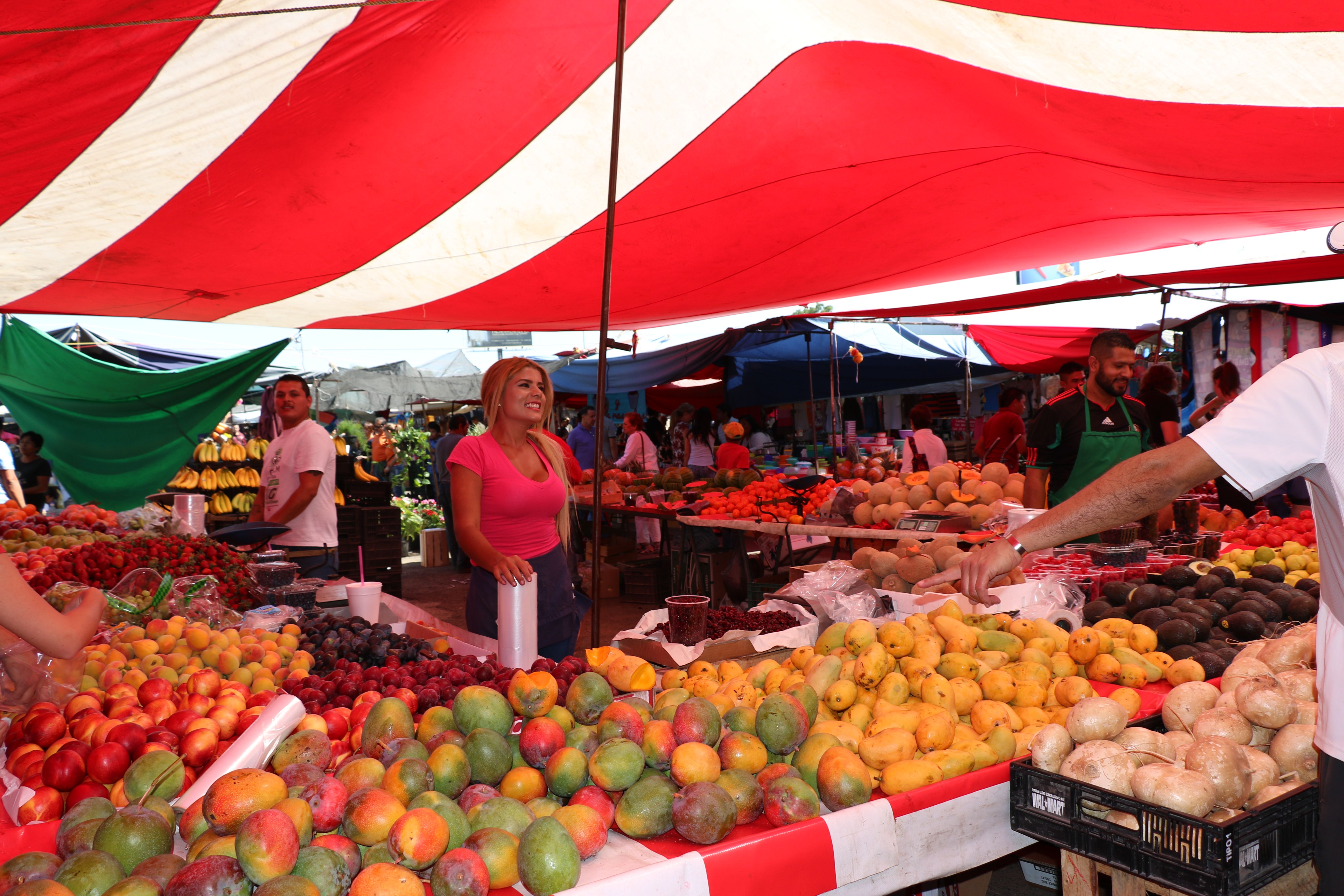 Market stalls lining an urban street