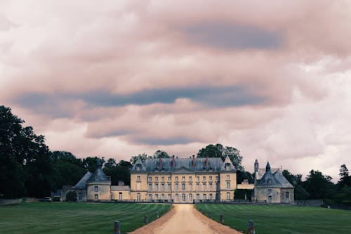 Free Photo of Mansion Under Cloudy Sky Stock Photo