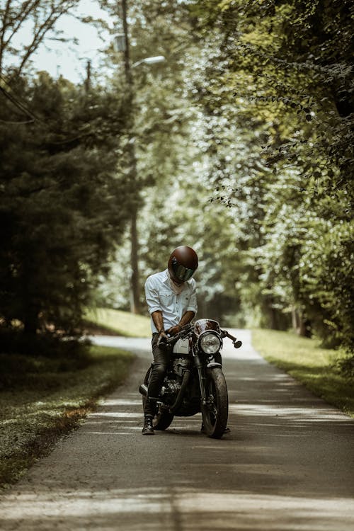 Man Riding On Motorcycle