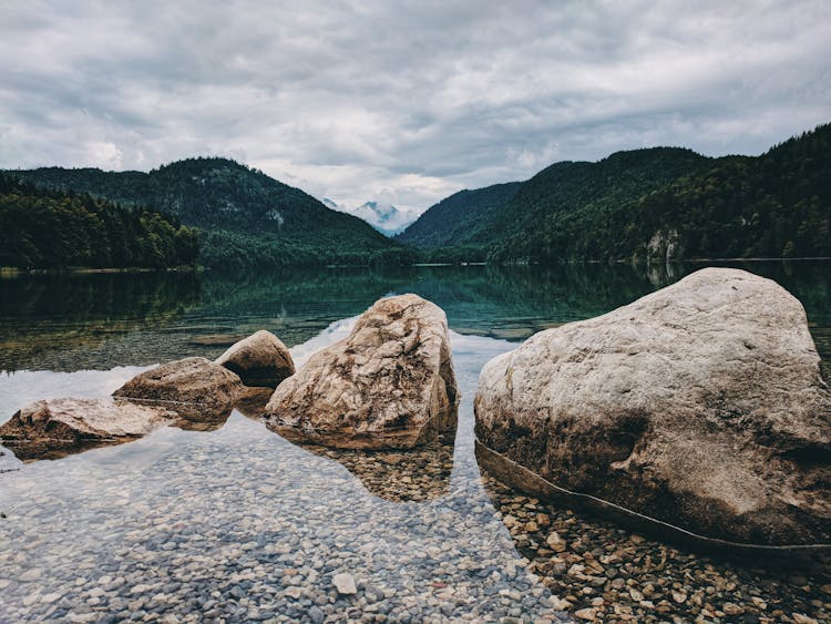 Photo Of Boulders On Lake