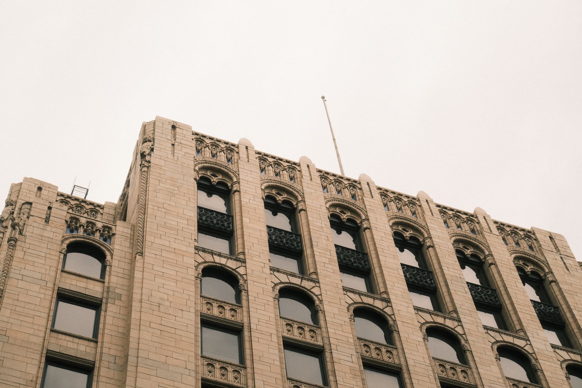 Daytime exterior view of an Art Deco skyscraper in Detroit, Michigan