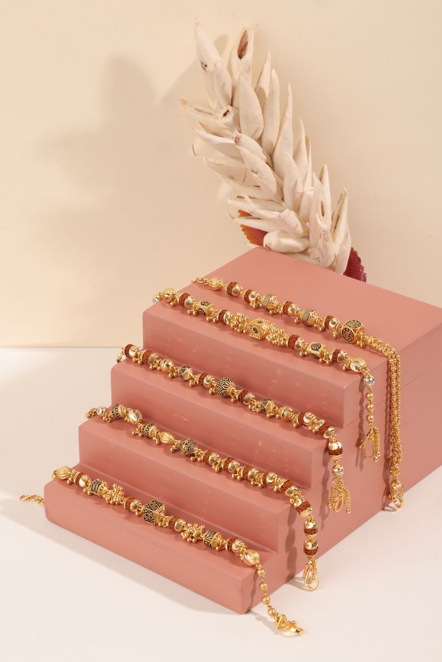 Stylish Gold Bracelets Displayed Pink Jewellery