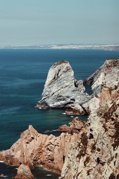 Breathtaking view of Cabo da Roca cliffs with the Atlantic Ocean in Portugal, perfect for travel and nature enthusiasts.