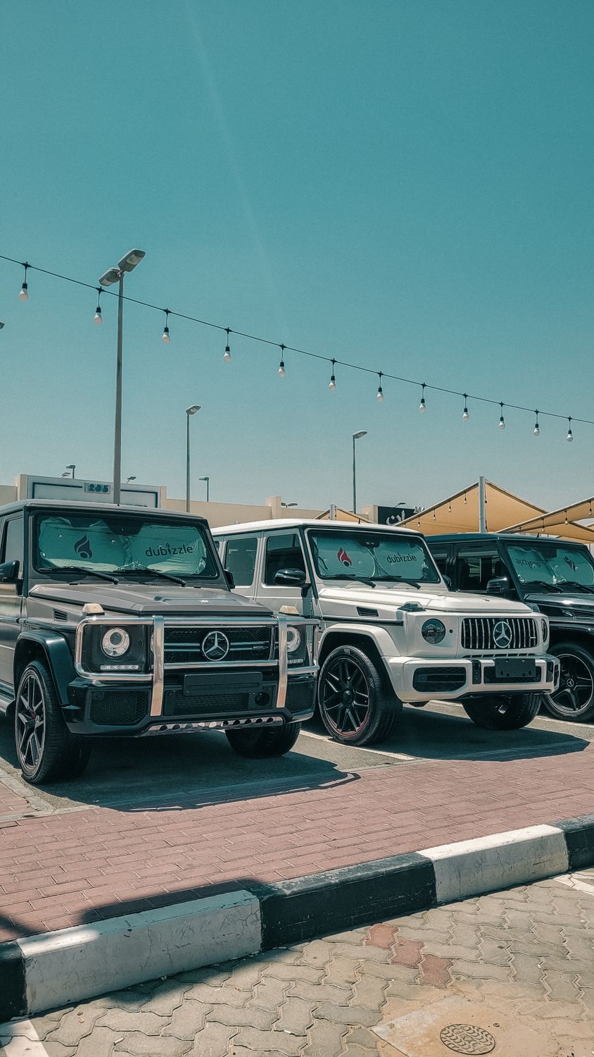 Mercedes G-Wagens in the Car Dealership Parking Lot · Free Stock Photo