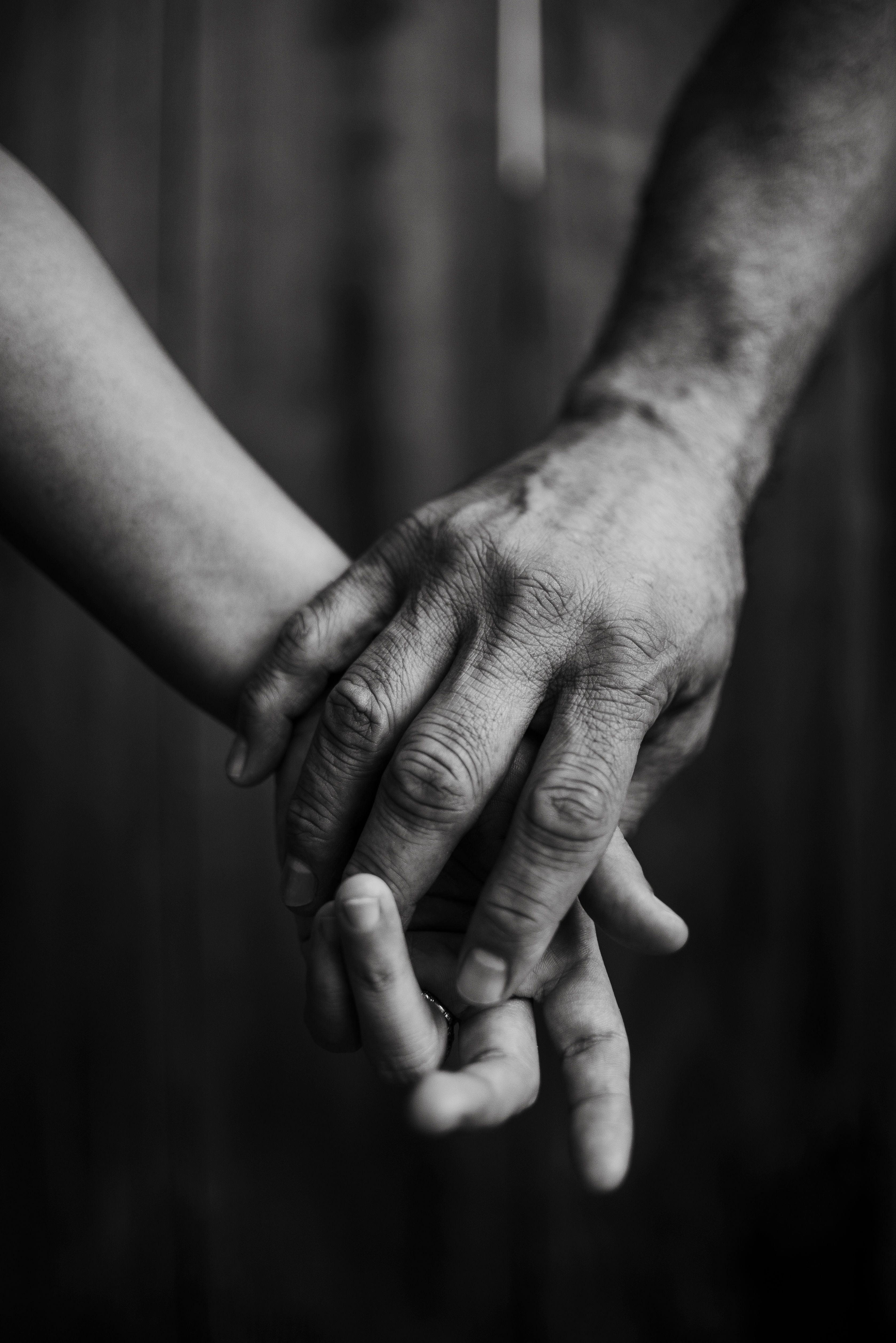 Couple Holding Hands in Black and White · Free Stock Photo