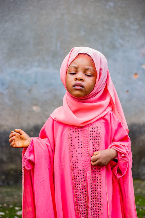 Little Girl in Pink Abaya Dress and Hijab Headscarf