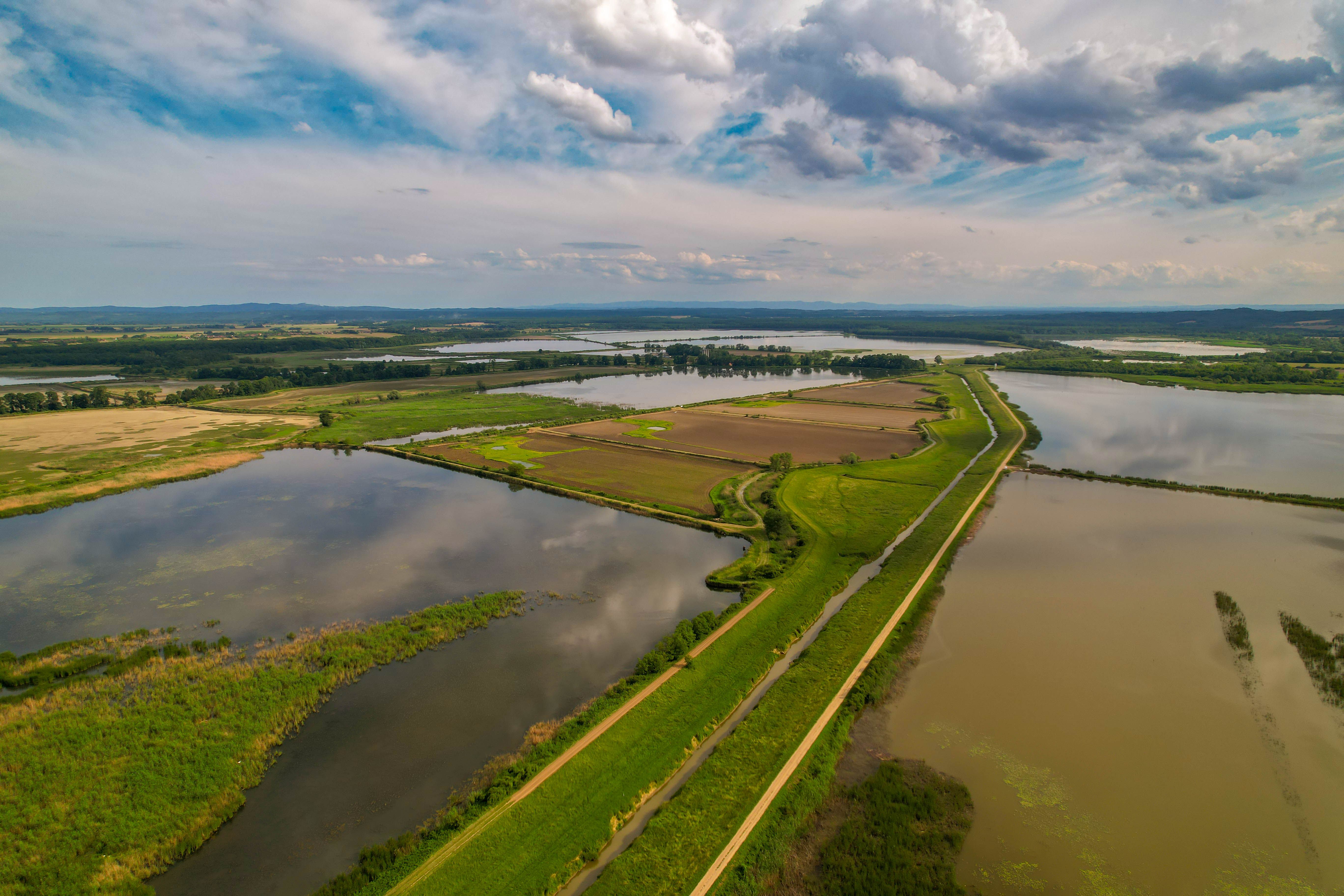 A stunning aerial view of the green countryside and waterscapes in Kaniška Iva, Croatia.