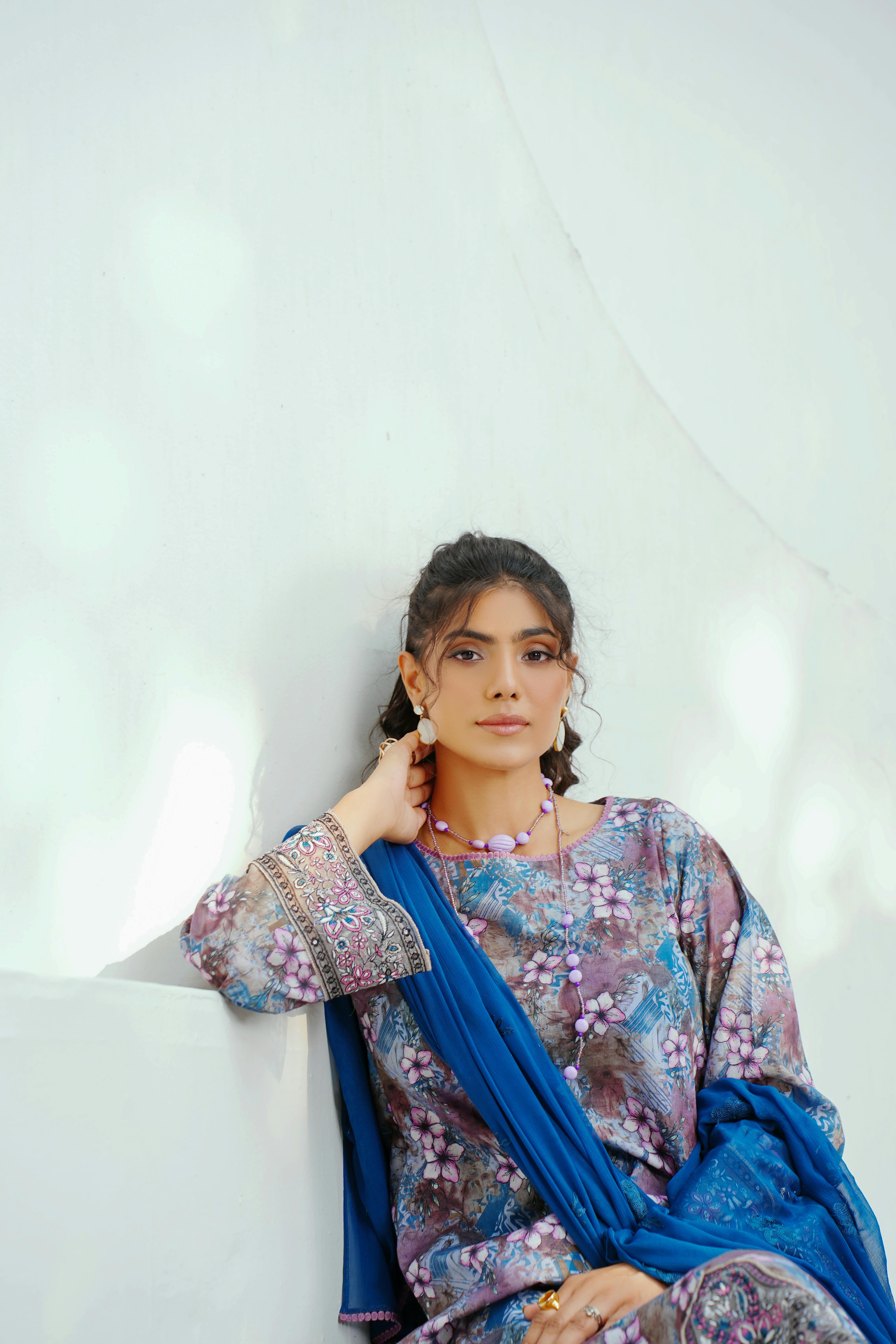 woman wearing in blue sari