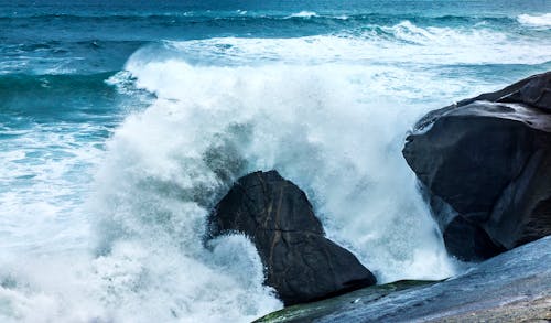 Sea Waves Splashing On Rocks