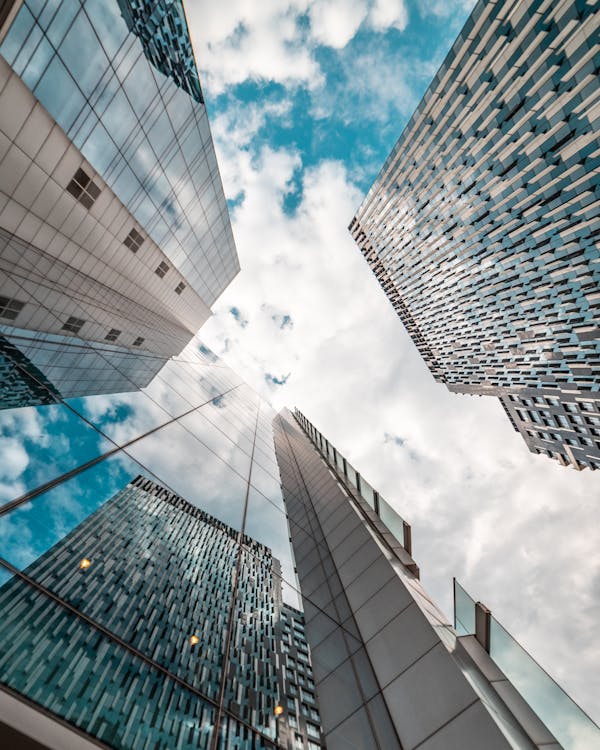 Free Low-Angle Photography of Glass Buildings Stock Photo