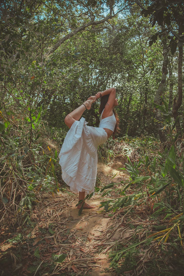 Photo Of Woman Doing Yoga In Forest