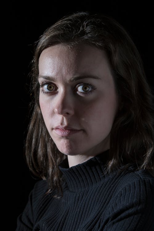 Free Portrait Photography of Woman Wearing Black Sweater Stock Photo
