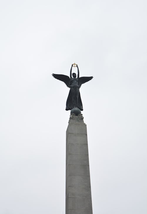 Low Angle Photo of Angel Statue