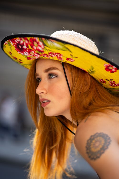 Free Close-Up Photo of Woman Wearing Sun Hat Stock Photo