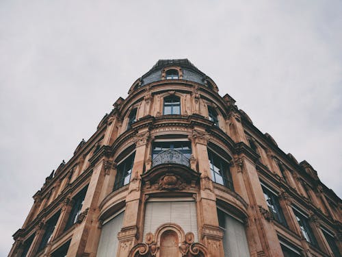 Low Angle Photography of Brown Concrete Structre