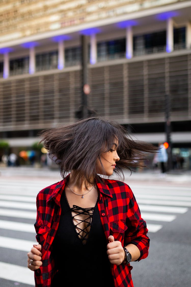 Photo Of Woman Flipping Her Hair